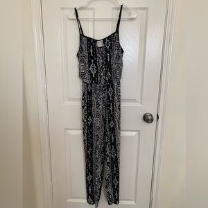 Black and white patterned jump suit.